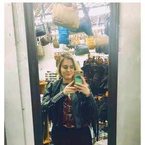 Cropped black leather jacket.